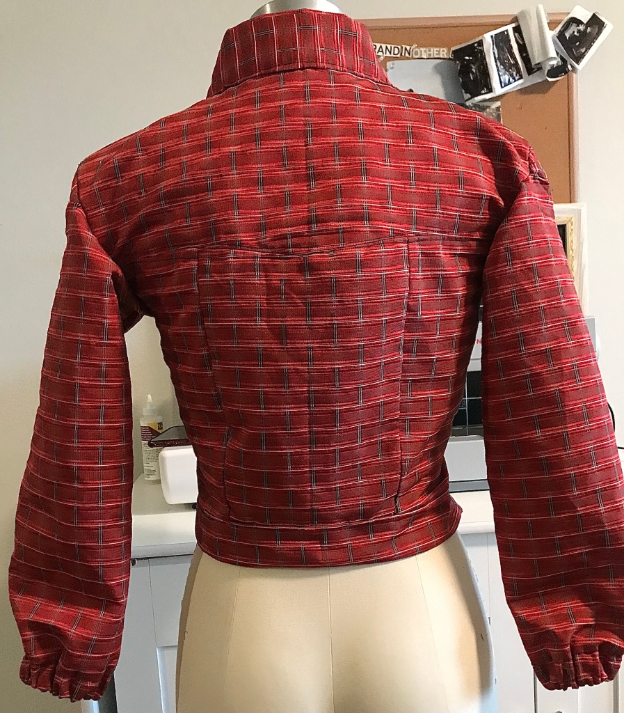Back of Red woman’s handmade jacket